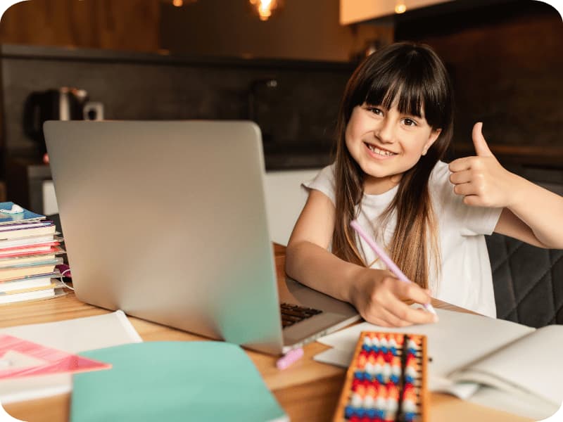 A child in an interactive virtual session with an Educational Therapist